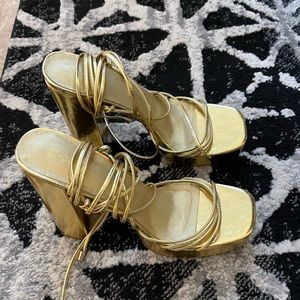 Gold platform heels